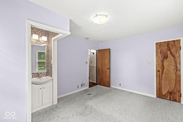 4010 S Bazil Ave, Indianapolis, IN 46239 - unfurnished bedroom with carpet and a textured ceiling