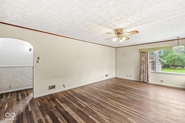 4010 S Bazil Ave, Indianapolis, IN 46239 - empty room with hardwood / wood-style flooring, a ceiling fan, crown molding, a textured ceiling, and arched walkways