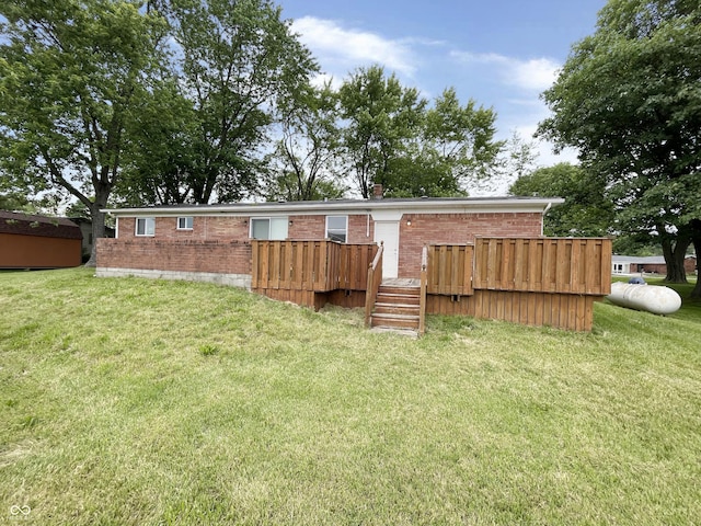 5667 Broyles Rd, Avon, IN 46123 - rear view of property with brick siding, a yard, and a wooden deck