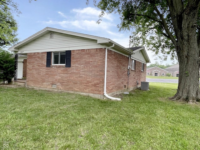 5667 Broyles Rd, Avon, IN 46123 - view of home's exterior featuring brick siding and a lawn