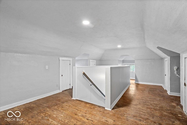 57 E S St, Mooresville, IN 46158 - bonus room with a textured ceiling, vaulted ceiling, and hardwood / wood-style flooring