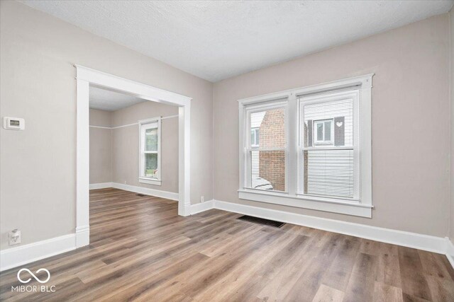 57 E S St, Mooresville, IN 46158 - unfurnished room featuring wood finished floors