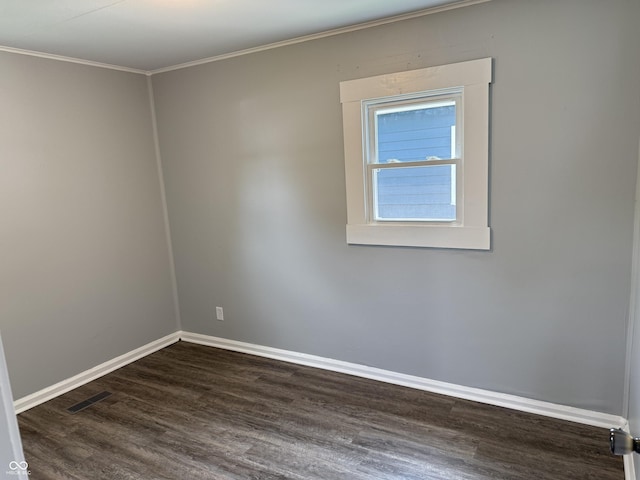 224 SW 19th St, Richmond, IN 47374 - empty room featuring dark wood-style floors and ornamental molding