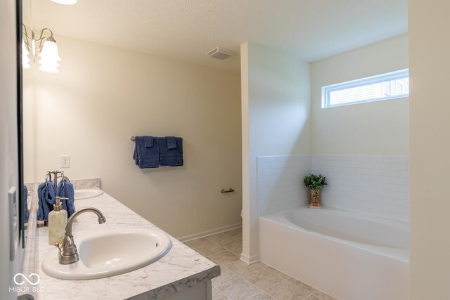 3541 N Hackberry St N, Bloomington, IN 47404 - full bath with a garden tub, double vanity, and tile patterned flooring