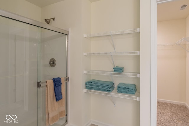 3541 N Hackberry St N, Bloomington, IN 47404 - full bathroom with a shower stall and a walk in closet