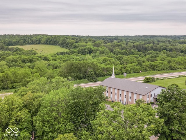 3541 N Hackberry St N, Bloomington, IN 47404 - aerial view of property and surrounding area with a heavily wooded area
