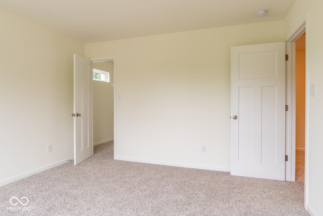 3541 N Hackberry St N, Bloomington, IN 47404 - carpeted spare room featuring a smoke detector and baseboards