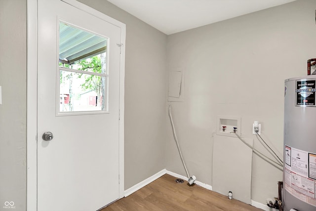 12471 N 100 E, Alexandria, IN 46001 - washroom with gas water heater, hookup for a washing machine, light wood-style floors, and electric panel