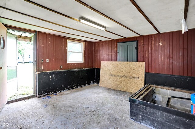 12471 N 100 E, Alexandria, IN 46001 - kitchen featuring wooden walls and unfinished concrete floors