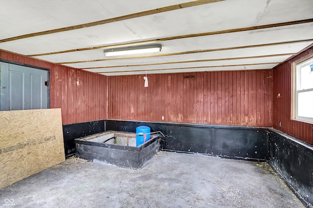 12471 N 100 E, Alexandria, IN 46001 - miscellaneous room with unfinished concrete flooring and wooden walls