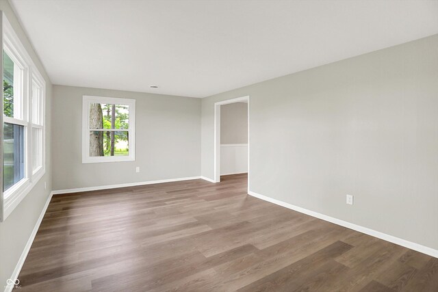 12471 N 100 E, Alexandria, IN 46001 - empty room featuring wood finished floors and baseboards