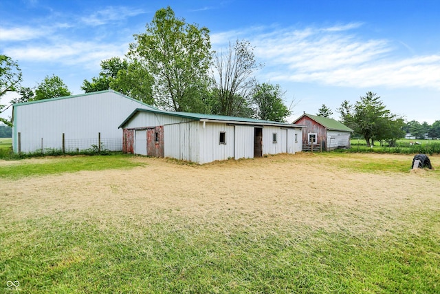 12471 N 100 E, Alexandria, IN 46001 - view of pole building featuring a lawn