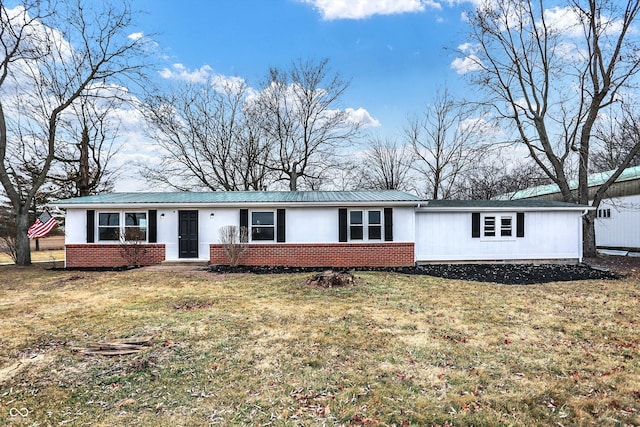 12471 N 100 E, Alexandria, IN 46001 - ranch-style house with brick siding, a front yard, and a metal roof