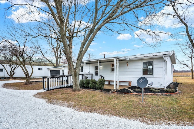 12471 N 100 E, Alexandria, IN 46001 - ranch-style home featuring a metal roof and a front yard