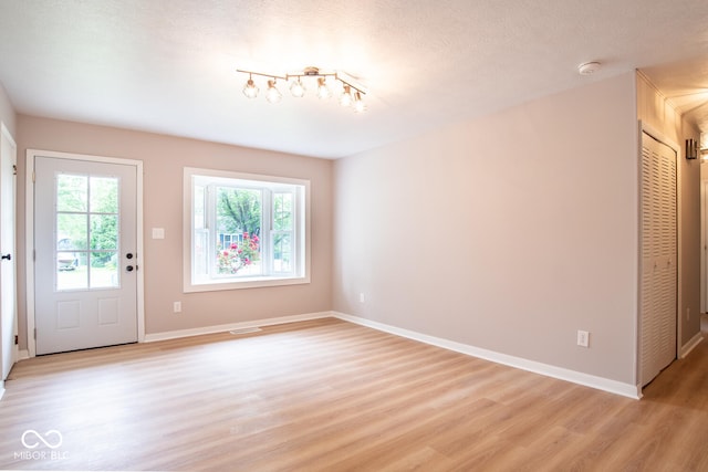 3212 S Fairington Dr, Bloomington, IN 47403 - entryway featuring light wood-style flooring and baseboards