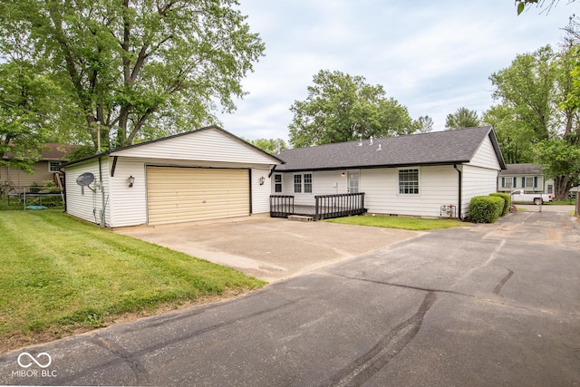 3212 S Fairington Dr, Bloomington, IN 47403 - single story home featuring a detached garage, a front lawn, a wooden deck, and a shingled roof