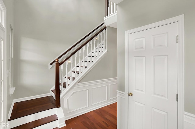 13191 Roma, Carmel, IN 46074 - staircase with wood finished floors and a towering ceiling