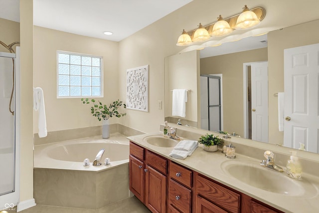 13191 Roma, Carmel, IN 46074 - bathroom featuring a shower stall, a garden tub, double vanity, and tile patterned flooring