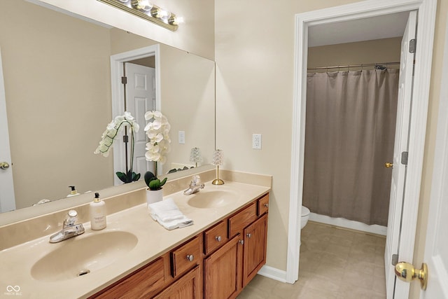 13191 Roma, Carmel, IN 46074 - bathroom with double vanity, a shower with curtain, and tile patterned floors