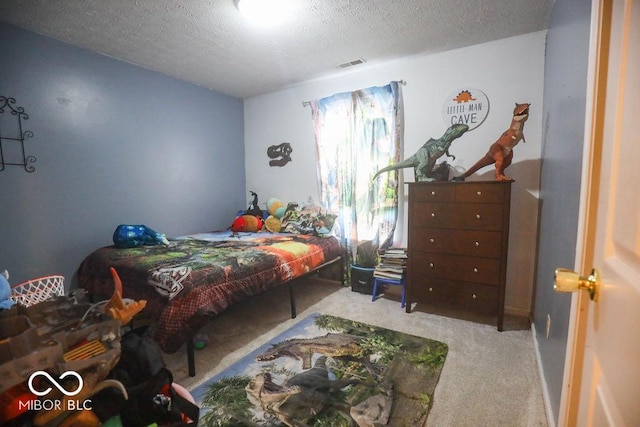 982 Ramsgate Rd, Greenwood, IN 46143 - bedroom featuring light colored carpet and a textured ceiling