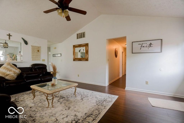 982 Ramsgate Rd, Greenwood, IN 46143 - living room featuring a ceiling fan, dark wood-type flooring, high vaulted ceiling, and a textured ceiling