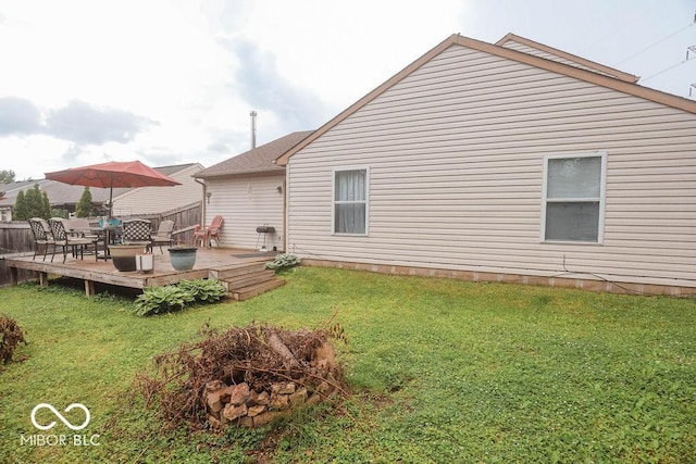 982 Ramsgate Rd, Greenwood, IN 46143 - back of house featuring a deck, a lawn, and outdoor dining area