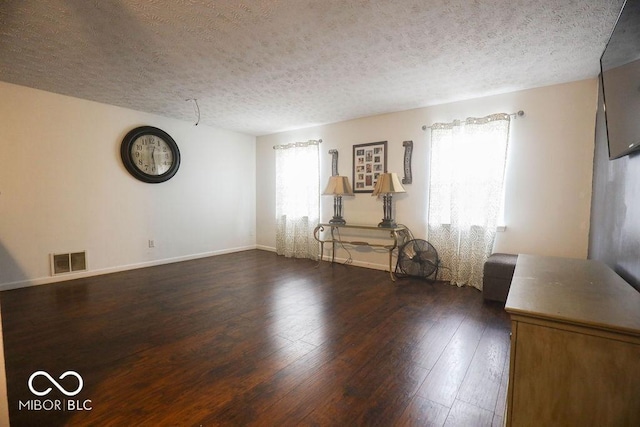 982 Ramsgate Rd, Greenwood, IN 46143 - empty room with a textured ceiling and dark wood finished floors