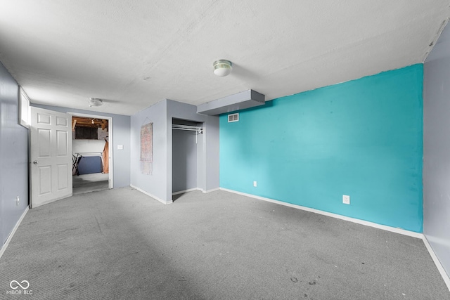 2211 S Andrews Rd, Yorktown, IN 47396 - unfurnished bedroom featuring carpet floors, a closet, and a textured ceiling