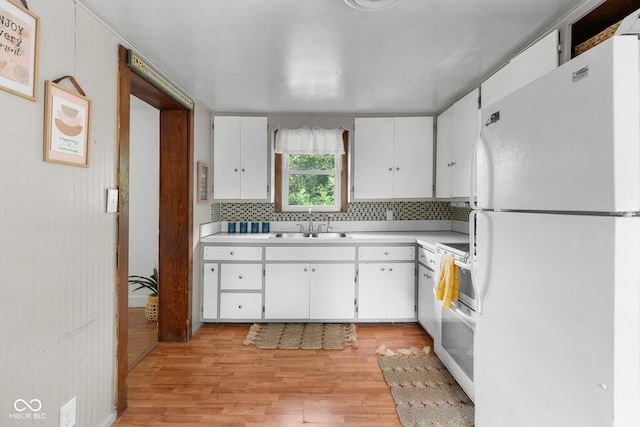 2211 S Andrews Rd, Yorktown, IN 47396 - kitchen featuring white appliances, light wood-style floors, light countertops, and white cabinetry