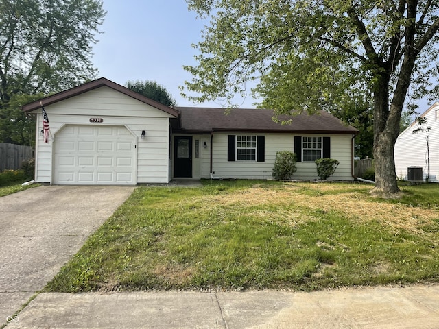 5331 Yucatan Dr, Indianapolis, IN 46237 - ranch-style home with a garage, concrete driveway, and a shingled roof