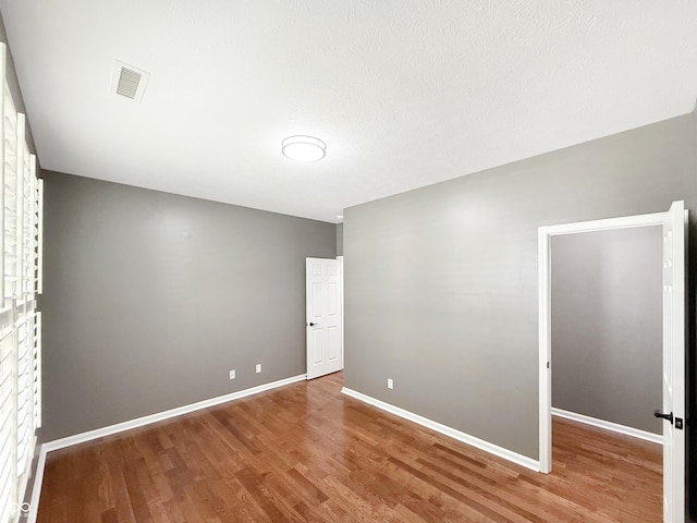 9302 N Bayland Dr, Mccordsville, IN 46055 - unfurnished room featuring wood finished floors