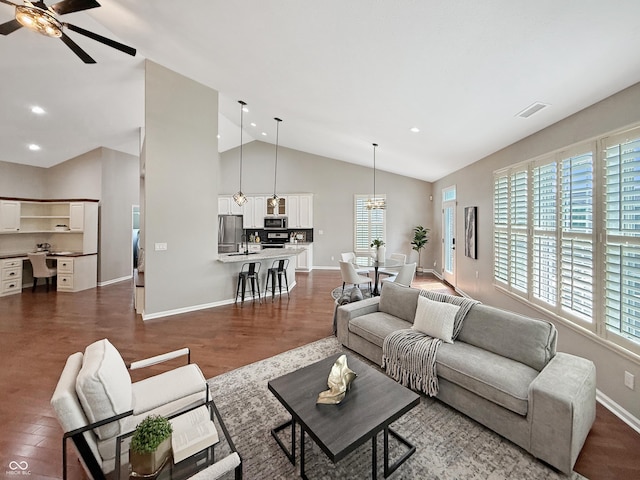 9302 N Bayland Dr, Mccordsville, IN 46055 - living area featuring a ceiling fan, dark wood-type flooring, recessed lighting, a desk, and high vaulted ceiling
