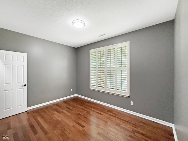 9302 N Bayland Dr, Mccordsville, IN 46055 - empty room with wood finished floors