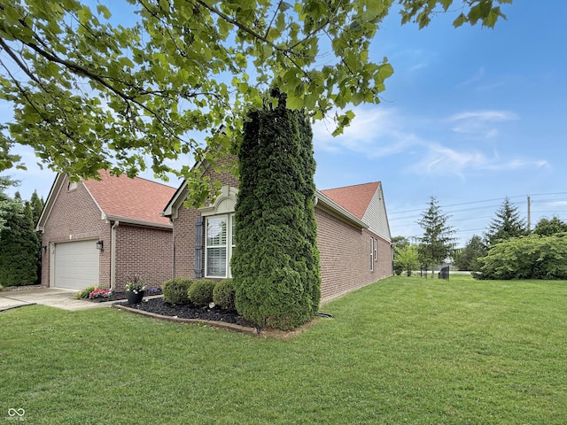9302 N Bayland Dr, Mccordsville, IN 46055 - view of property exterior with brick siding, a yard, concrete driveway, a garage, and a shingled roof