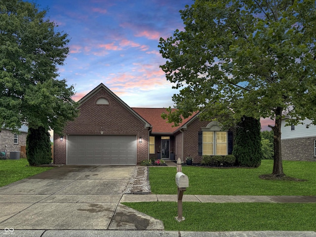 9302 N Bayland Dr, Mccordsville, IN 46055 - view of front of home featuring brick siding, concrete driveway, a garage, and a yard