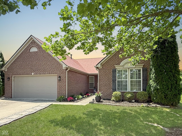 9302 N Bayland Dr, Mccordsville, IN 46055 - view of front of property featuring brick siding, a garage, a front yard, and concrete driveway