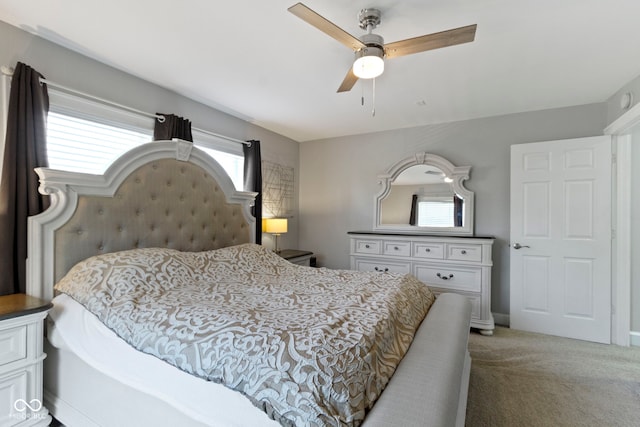 3045 Ruckle St, Indianapolis, IN 46205 - bedroom with light carpet, multiple windows, and ceiling fan