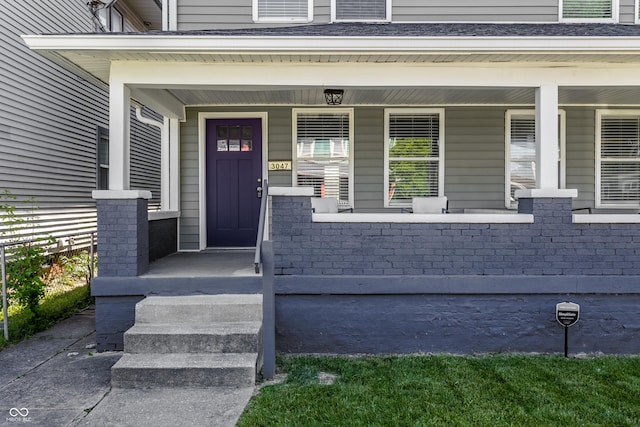 3045 Ruckle St, Indianapolis, IN 46205 - doorway to property with covered porch