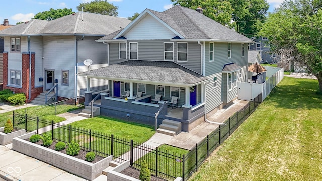 3045 Ruckle St, Indianapolis, IN 46205 - view of front of property with a garden, roof with shingles, a chimney, and a front lawn