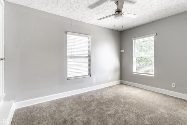 3045 Ruckle St, Indianapolis, IN 46205 - carpeted spare room with a textured ceiling and ceiling fan