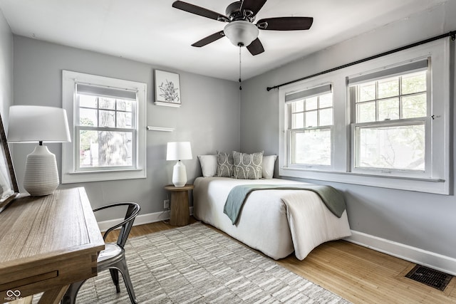 5760 Central Ave N, Indianapolis, IN 46220 - bedroom with light wood-type flooring and ceiling fan