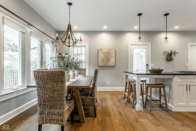 5760 Central Ave N, Indianapolis, IN 46220 - dining space featuring a chandelier, recessed lighting, and light wood finished floors