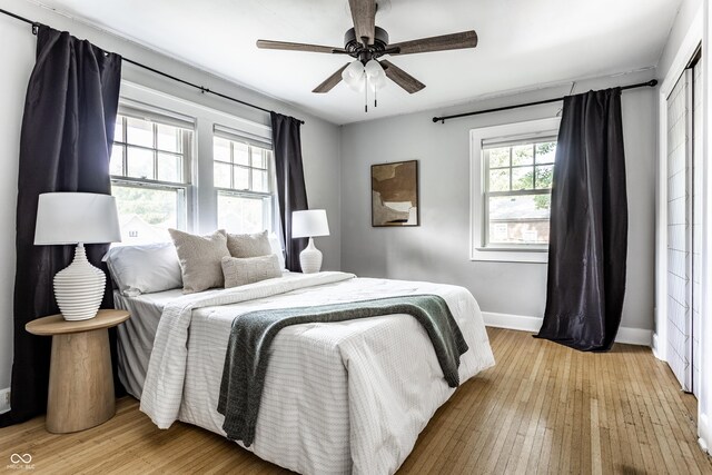 5760 Central Ave N, Indianapolis, IN 46220 - bedroom with light wood-style flooring and ceiling fan
