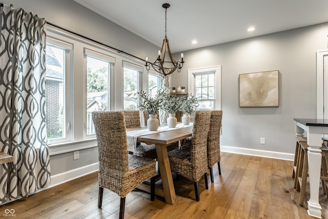 5760 Central Ave N, Indianapolis, IN 46220 - dining space featuring a chandelier, light wood-type flooring, and recessed lighting