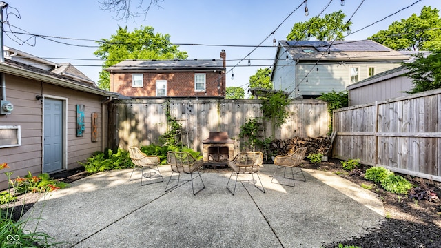 5760 Central Ave N, Indianapolis, IN 46220 - fenced backyard with a patio and area for grilling