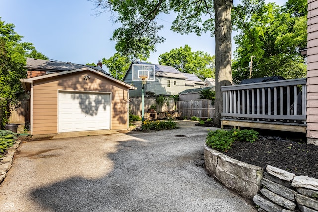 5760 Central Ave N, Indianapolis, IN 46220 - view of yard with an outbuilding, driveway, and a garage