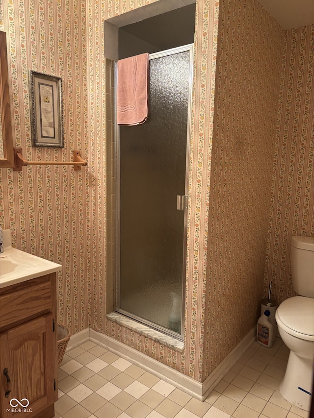 9011 Camby Rd, Camby, IN 46113 - full bath with tile patterned flooring, wallpapered walls, a stall shower, and vanity