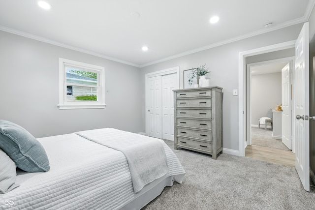 5205 Staughton Dr, Indianapolis, IN 46226 - bedroom with crown molding, recessed lighting, light carpet, and a closet