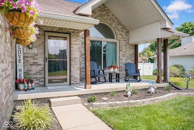 2384 Fairfax Dr, Columbus, IN 47203 - view of exterior entry with a porch and brick siding