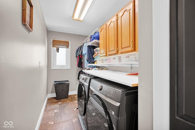 2384 Fairfax Dr, Columbus, IN 47203 - laundry area with washer and clothes dryer and cabinet space